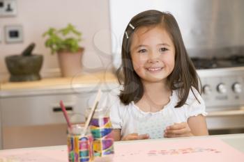Royalty Free Photo of a Child Drawing Pictures