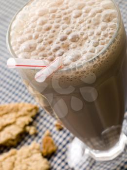 Royalty Free Photo of a Chocolate Milkshake With a Cookie