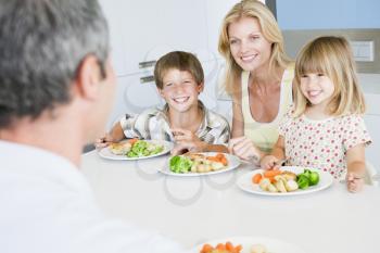 Royalty Free Photo of a Family Having a Meal