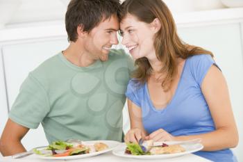 Royalty Free Photo of a Romantic Couple Having Dinner