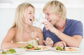 Royalty Free Photo of a Young Couple Having Dinner
