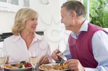 Royalty Free Photo of a Couple Having a Meal