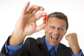 Royalty Free Photo of a Man Holding Dice