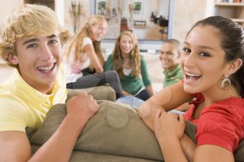 Royalty Free Photo of Teens Watching TV