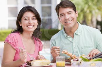 Royalty Free Photo of a Couple Eating