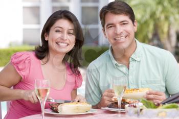 Royalty Free Photo of a Couple Dining Outside
