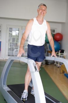 Royalty Free Photo of a Man on a Treadmill