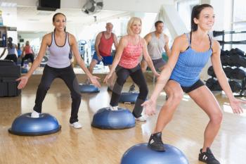Royalty Free Clipart Image of an Exercise Class