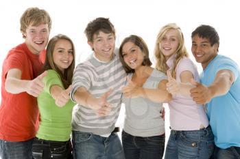Royalty Free Photo of Teens Giving a Thumbs Up