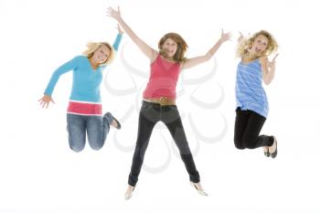 Teenage Girls Jumping In The Air