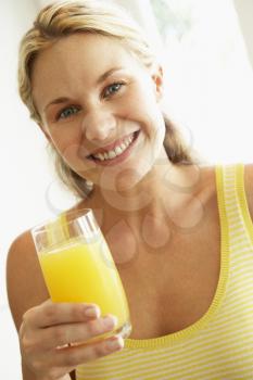 Royalty Free Photo of a Woman With Juice
