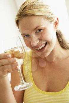 Royalty Free Photo of a Woman Drinking a Glass of Wine