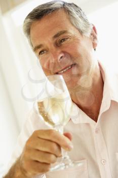 Royalty Free Photo of a Man Drinking Wine