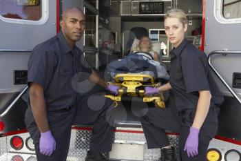 Royalty Free Photo of Paramedics Unloading a Patient