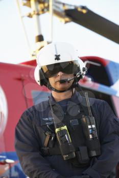 Royalty Free Photo of a Paramedic in Front of an Air Ambulance