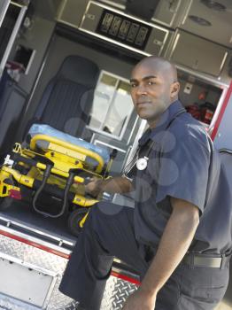 Royalty Free Photo of a Paramedic With an Empty Gurney