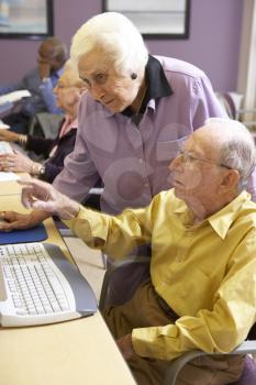 Royalty Free Photo of Seniors at a Computer