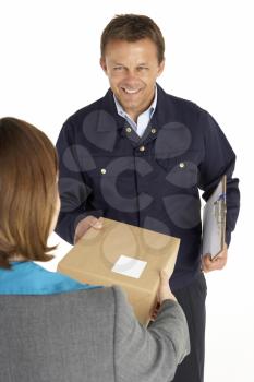Royalty Free Photo of a Courier Handing Over a Parcel