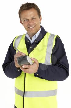 Royalty Free Photo of a Courier With an Electronic Clipboard