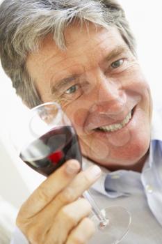 Royalty Free Photo of a Man With a Glass of Red Wine