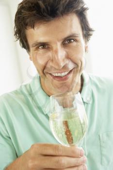 Royalty Free Photo of a Man With White Wine