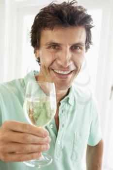Royalty Free Photo of a Man With a Glass of White Wine