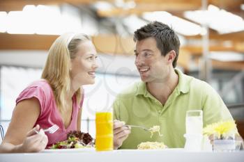 Royalty Free Photo of a Couple Having Lunch at a Mall