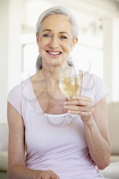 Royalty Free Photo of a Woman With a Glass of Wine