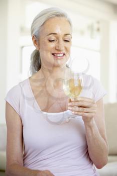 Royalty Free Photo of a Woman With a Glass of Wine