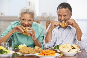 Royalty Free Photo of a Couple Having Lunch at Home
