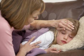 Royalty Free Photo of a Mother With a Sick Daughter