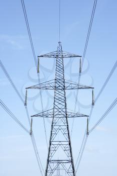 Royalty Free Photo of a Hydro Tower Against a Blue Sky