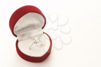 Royalty Free Photo of a Diamond Ring in a Heart Box