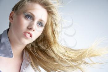 Royalty Free Photo of a Young Woman With Blowing Hair