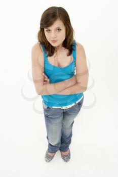Royalty Free Photo of a Girl With Her Arms Crossed