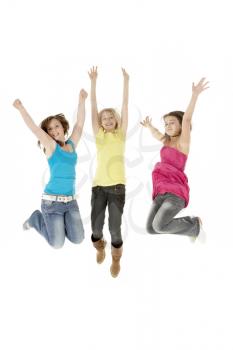 Royalty Free Photo of a Group of Three Girls Jumping