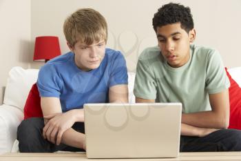 Royalty Free Photo of Two Boys With a Laptop