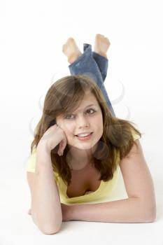 Royalty Free Photo of a Young Girl Lying on Her Stomach