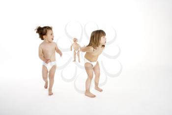 Royalty Free Photo of Toddlers in Diapers