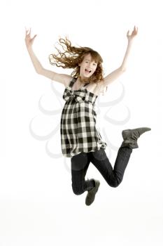 Royalty Free Photo of a Young Girl Jumping