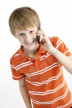 Royalty Free Photo of a Boy Talking on a Cellphone