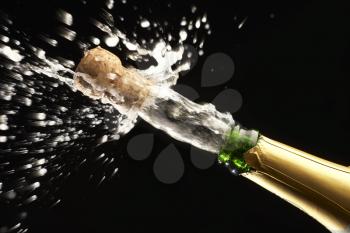 Royalty Free Photo of a Cork Being Popped Off Champagne