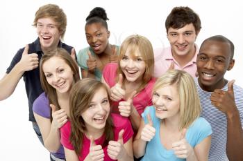 Royalty Free Photo of a Group of Teens Giving Thumbs Up