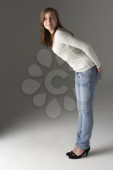 Royalty Free Photo of a Girl Leaning Forward