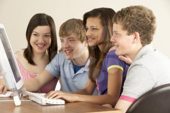 Royalty Free Photo of Four Children at the Computer