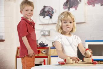 Royalty Free Photo of Two Children in a Playroom