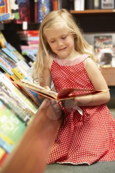 Royalty Free Photo of a Child in a Bookshop