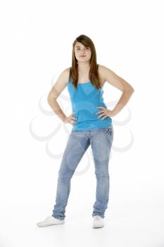 Royalty Free Photo of a Girl With Her Hands on Her Hips