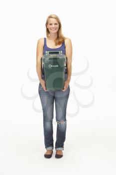 Young woman holding recycling container