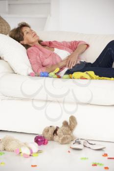 Exhausted grandmother enjoying a rest